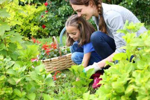 Volunteers sorting garden waste for recycling and composting